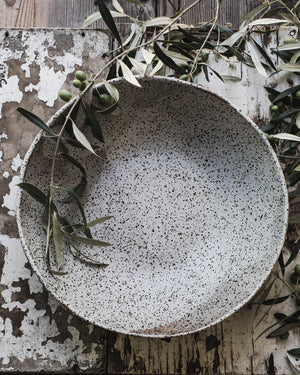 Extra large speckled rustic white bowl with a pinched texture handmade by clay beehive ceramic