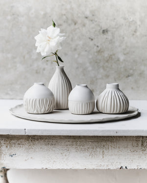 Satin white wheel thrown bud vases with carving details by clay beehive ceramics