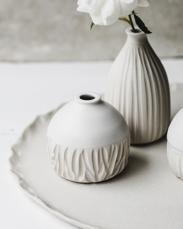 Satin white wheel thrown bud vases with carving details by clay beehive ceramics