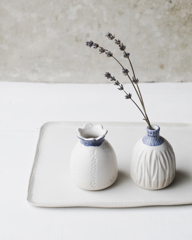 Carved Blue rim bud vases