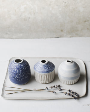 Little bud vases with sgraffito and carvings created by clay beehive ceramics