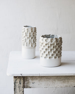 Large white sculptural pinched textured vases
