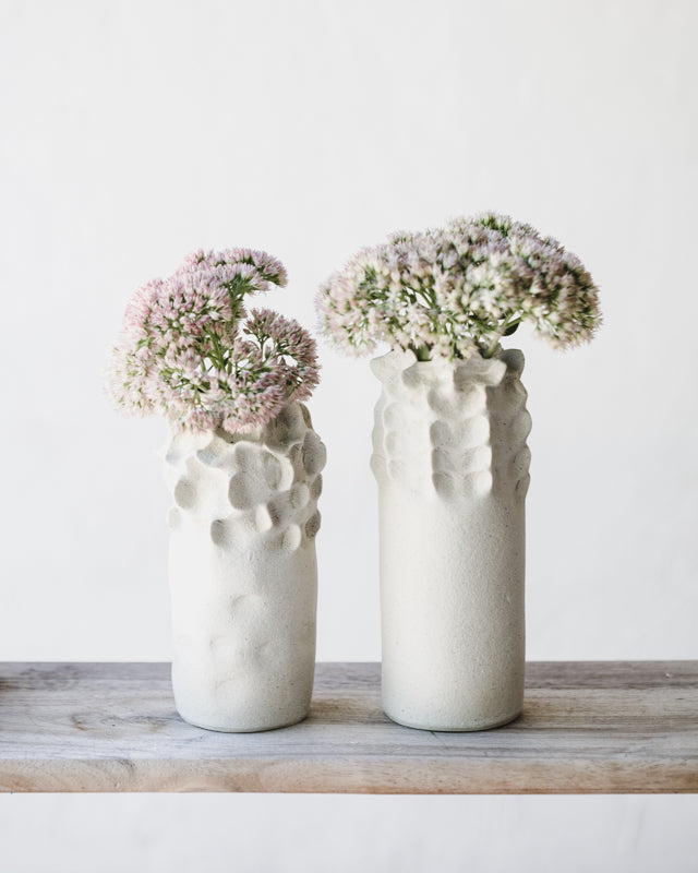 White tall slender vases with exposed raw clay exterior (Group Three)