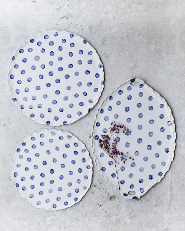 pretty polka dot platter plates with decorative frilly rims by clay beehive ceramics
