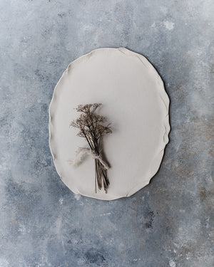 raw ceramic oval platter with curvy rim hand made by clay beehive ceramics