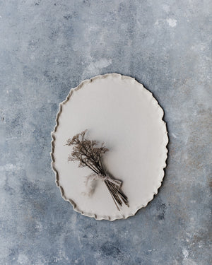 frilly rim natural raw clay oval shaped platter hand made by clay beehive ceramics