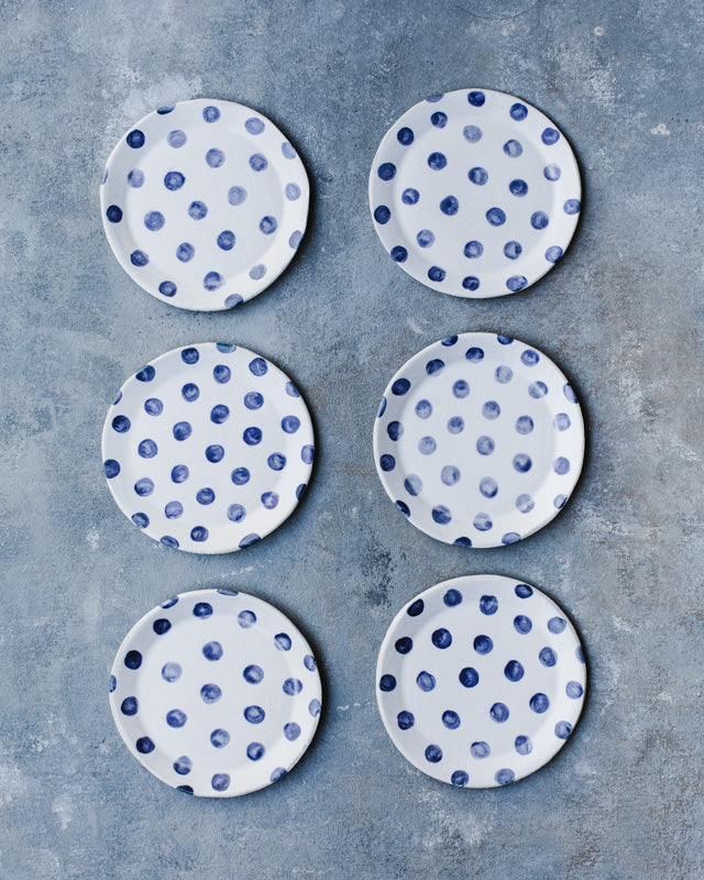 small handmade navy blue polka dot plates by clay beehive ceramics 14cm size