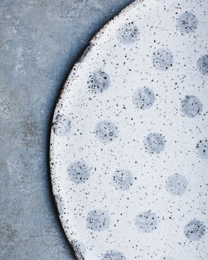 Closeup of Large 34cm ceramic platter with speckled spots by clay beehive ceramics